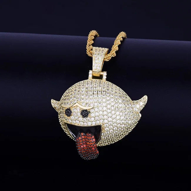Gold flying ghost pendant, rope chain, being displayed on jewelry display