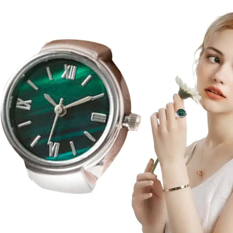 Silver and green finger punk watch ring close up with woman wearing it blonde