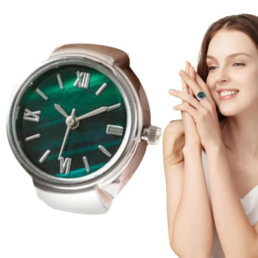 Silver and green finger punk watch ring close up with woman wearing it brown hair