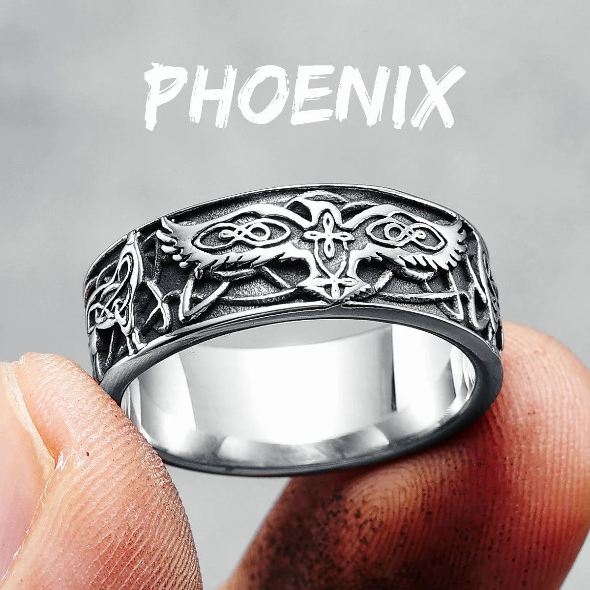 Phoenix Totem Ring Stainless Steel in two fingers with phoenix over top