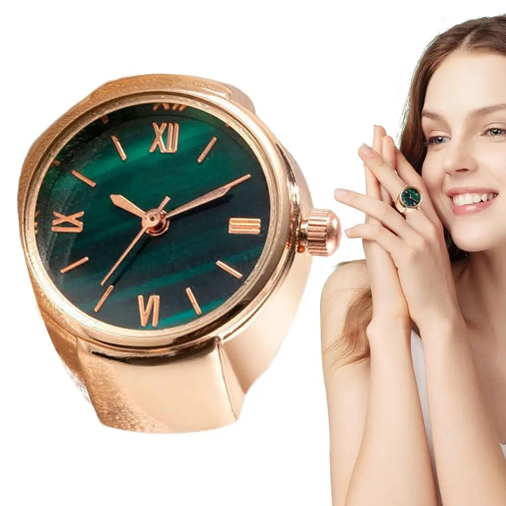 gold and green finger punk watch ring close up with woman wearing it brown hair