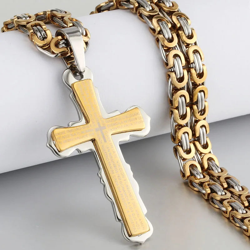 Gold and silver cross and chain displayed on jewelry stand
