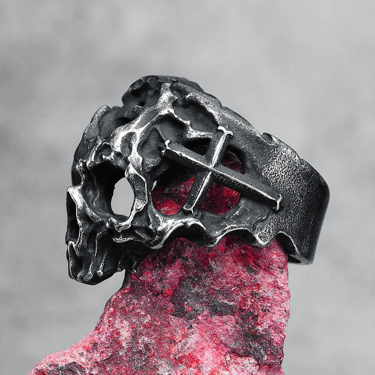 Hollow Skull Ring displayed on crystal mount, side right 