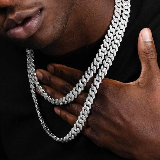 White gold cuban chain with Moissanite stones around mans neck