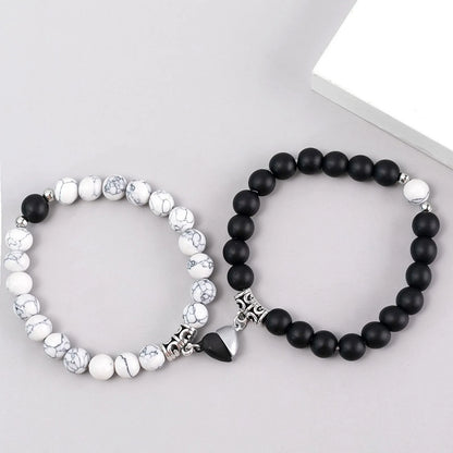 White cut black bracelet