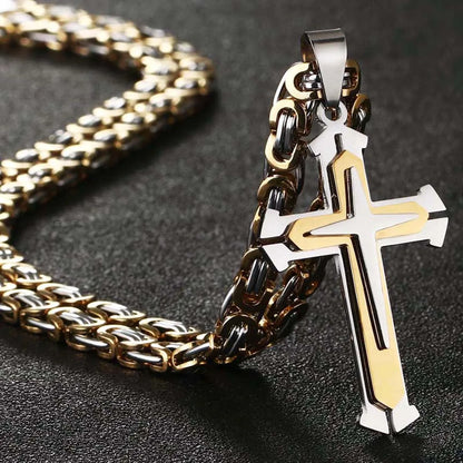 Silver and gold chain standing up with chain to the rear