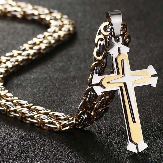 Silver and gold chain standing up with chain to the rear