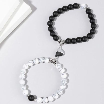 White cut black bracelet