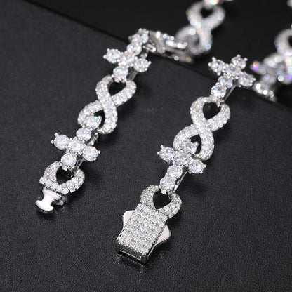 Moissanite crosses chain double lined diagonal on jewelry display  