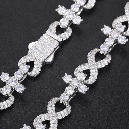 Moissanite crosses chain double lined diagonal on jewelry display clasped together 