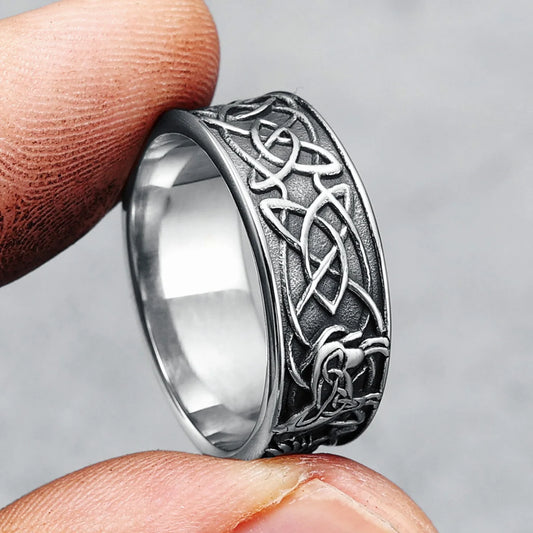 Phoenix Totem Ring Stainless Steel held in two fingers up and down view