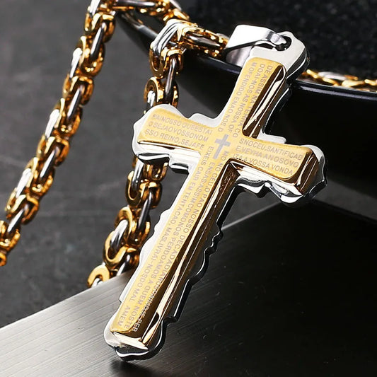 Gold and silver cross on table and bowl