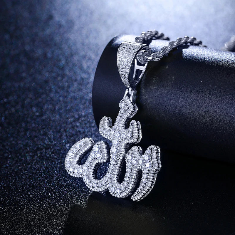 Silver Moissanite run pendant propped on jewelry display 